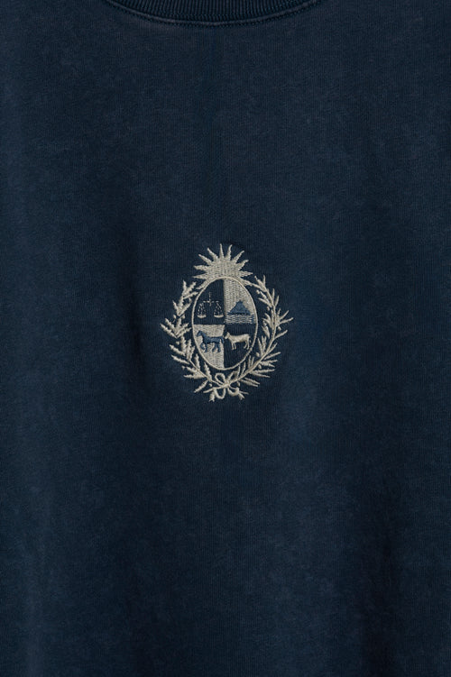 Buzo Azul Washed Escudo Uruguay