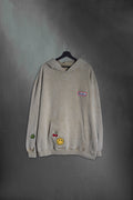 Hoodie khaki washed oversize con bordado Mushkana estilo cartel retro