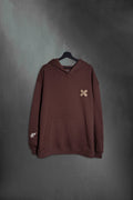 Hoodie oversize Rocky Road con bordado curita en cruz de Mushkana