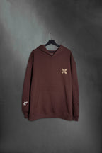 Hoodie oversize Rocky Road con bordado curita en cruz de Mushkana