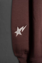 Hoodie Rocky Road Healing de espaldas con bordado curita